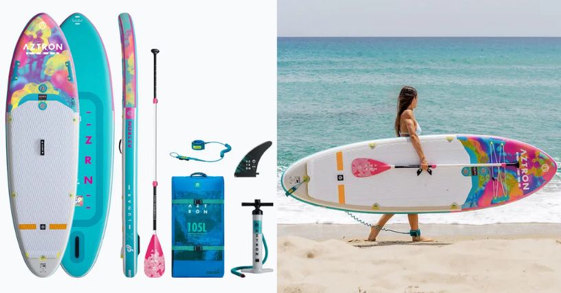 Pneumatyczna deska SUP Aztron Lunar 3.0 9'9" i kobieta niosąca ją pod pachą po plaży