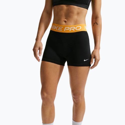Spodenki damskie Nike Pro Mid-Rise Biker 3" black/university gold/white
