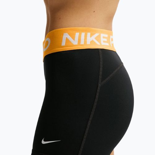 Spodenki damskie Nike Pro Mid-Rise Biker 3" black/university gold/white