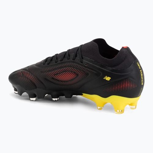 Buty piłkarskie New Balance Tekela Team Low V5 FG black 100/punch yellow/fire cracker