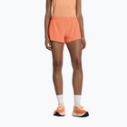 Spodenki damskie New Balance RC Seamless 3" tangerine heat