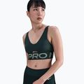 Biustonosz treningowy Nike Pro Indy Plunge seaweed/clay green/white