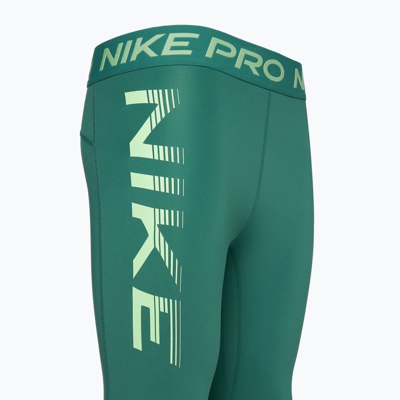 Legginsy treningowe damskie Nike Pro Dri-FIT Mid-Rise 7/8 Graphic bicoastal/vapour green/white 3