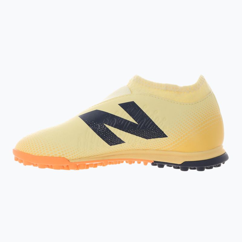 Buty piłkarskie dziecięce New Balance Tekela Magique V4+ Jr TF beige 9
