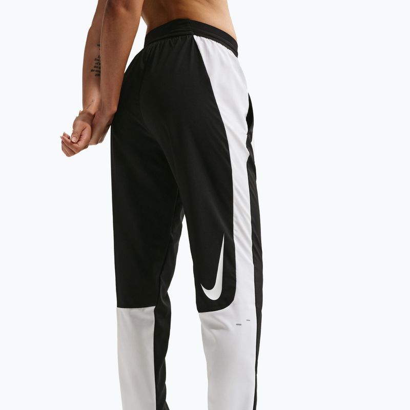 Spodnie do biegania damskie Nike Tempo Swoosh Dri-Fit Mid-Rise 7/8 black/white 4