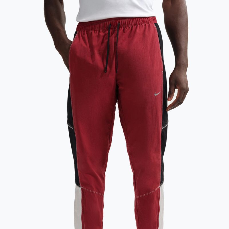 Spodnie do biegania męskie Nike Retro Dri-Fit team crimson/black 4