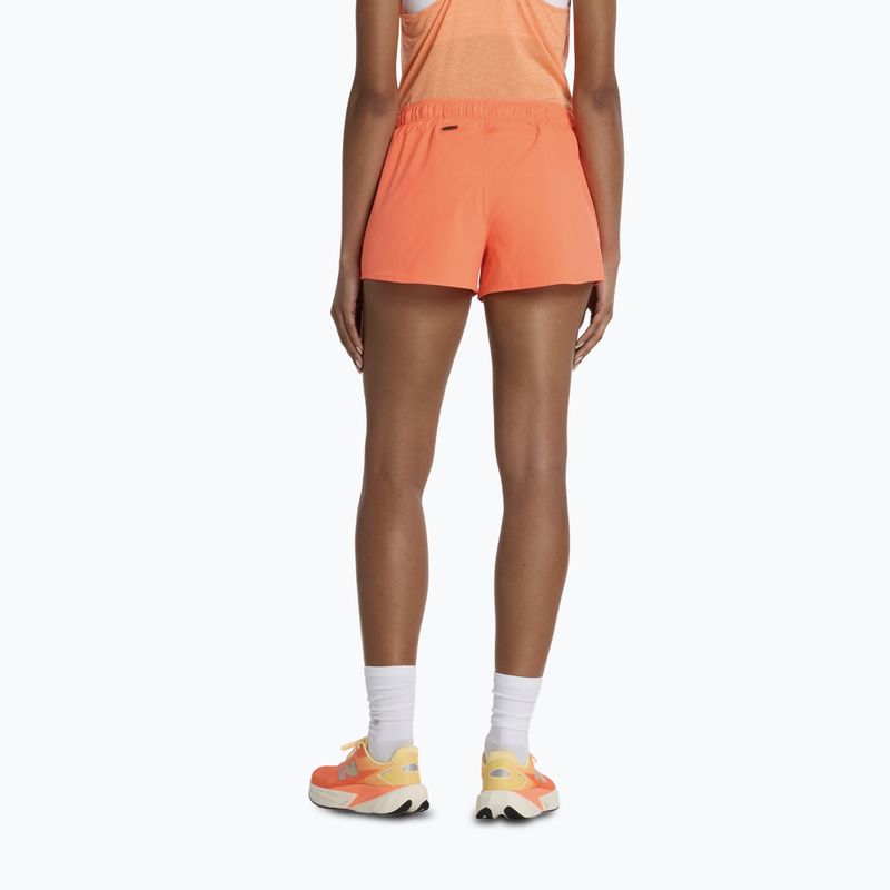 Spodenki damskie New Balance RC Seamless 3" tangerine heat 3