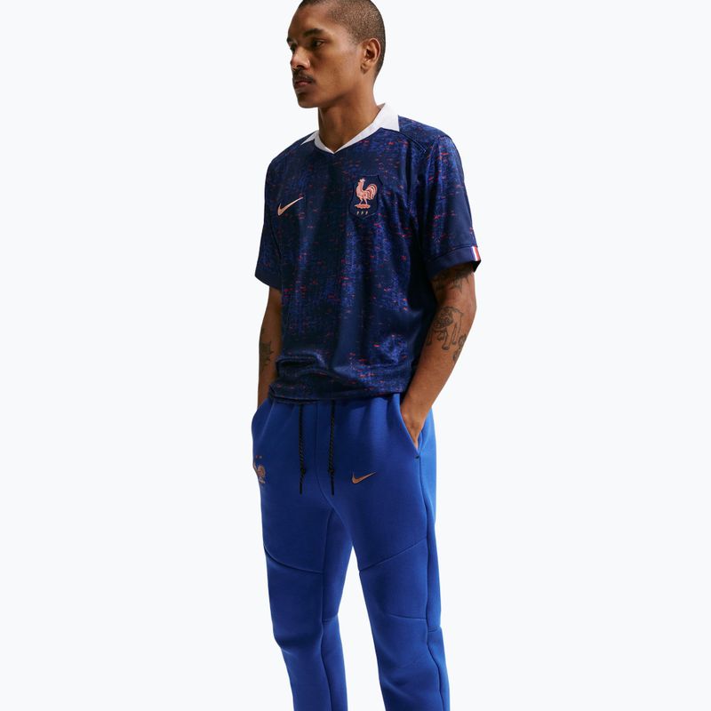 Spodnie piłkarskie męskie Nike FFF Tech Fleece Joggers game royal/metallic copper 4