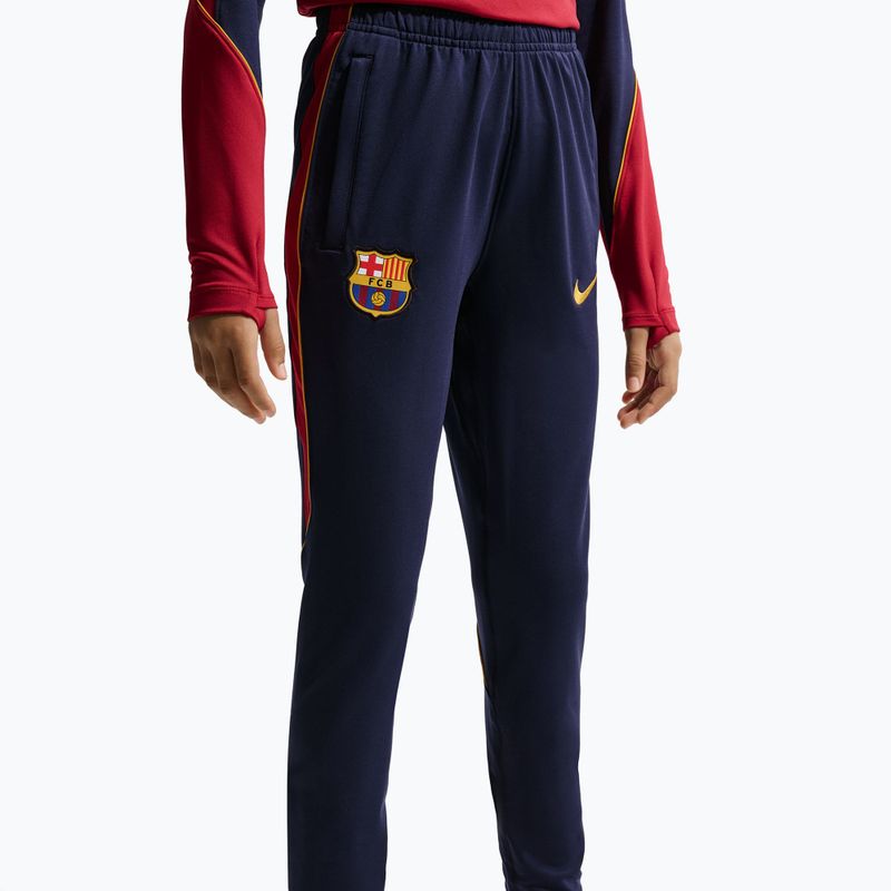 Spodnie piłkarskie dziecięce Nike FC Barcelona Strike Dri-Fit blackened blue/noble red/yellow 6